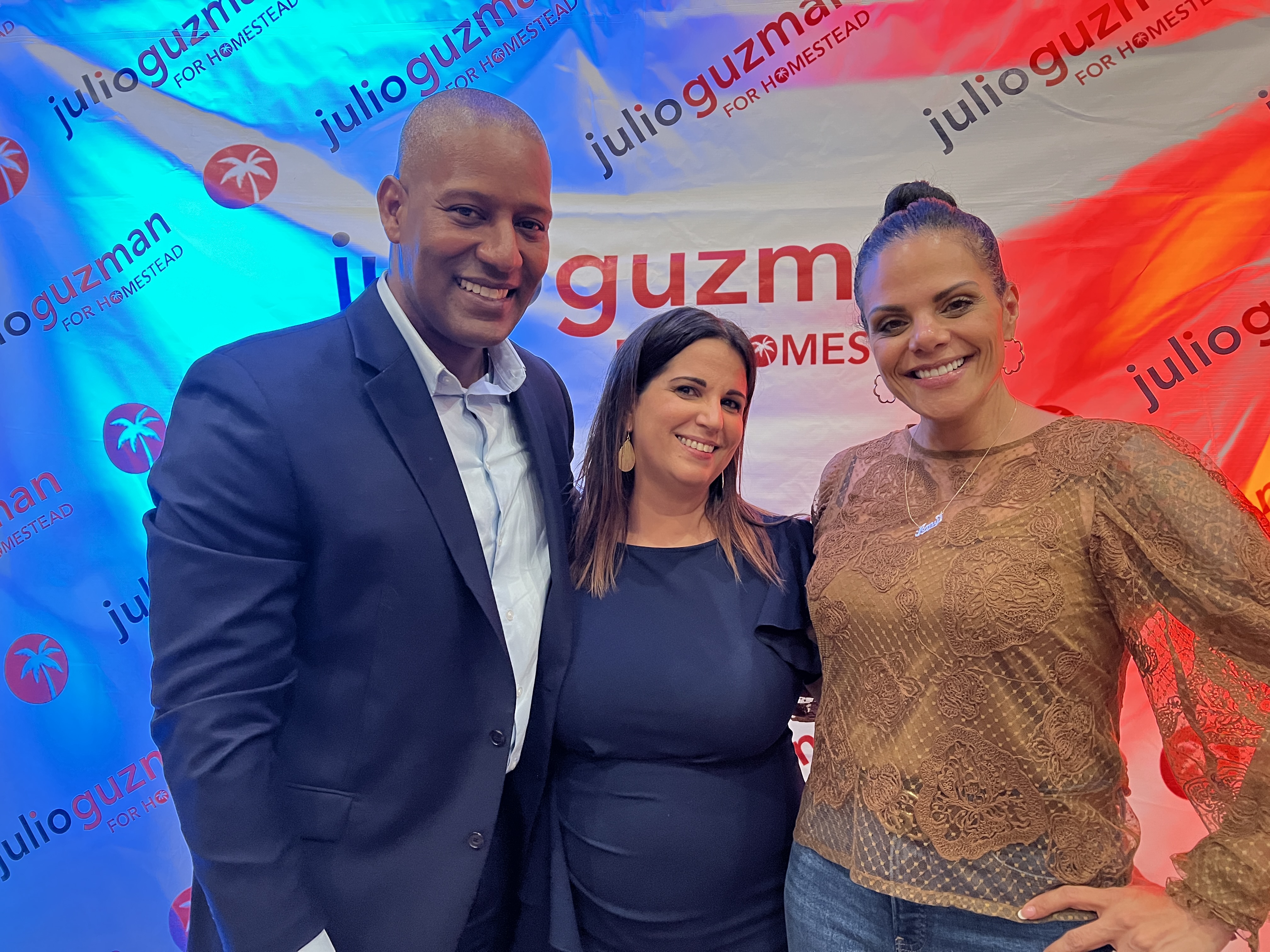 Julio Guzman with supporters at a campaign event
